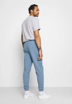 Kaotiko PANT - Jogginghose - Azul Fly - Herren -Kaotikoire Magasin 9ef002fc312d45c48ca92bcb873582c3